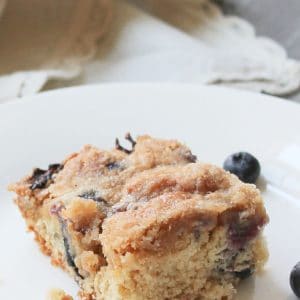 Blueberry Coffee Cake with brown sugar topping on plate.