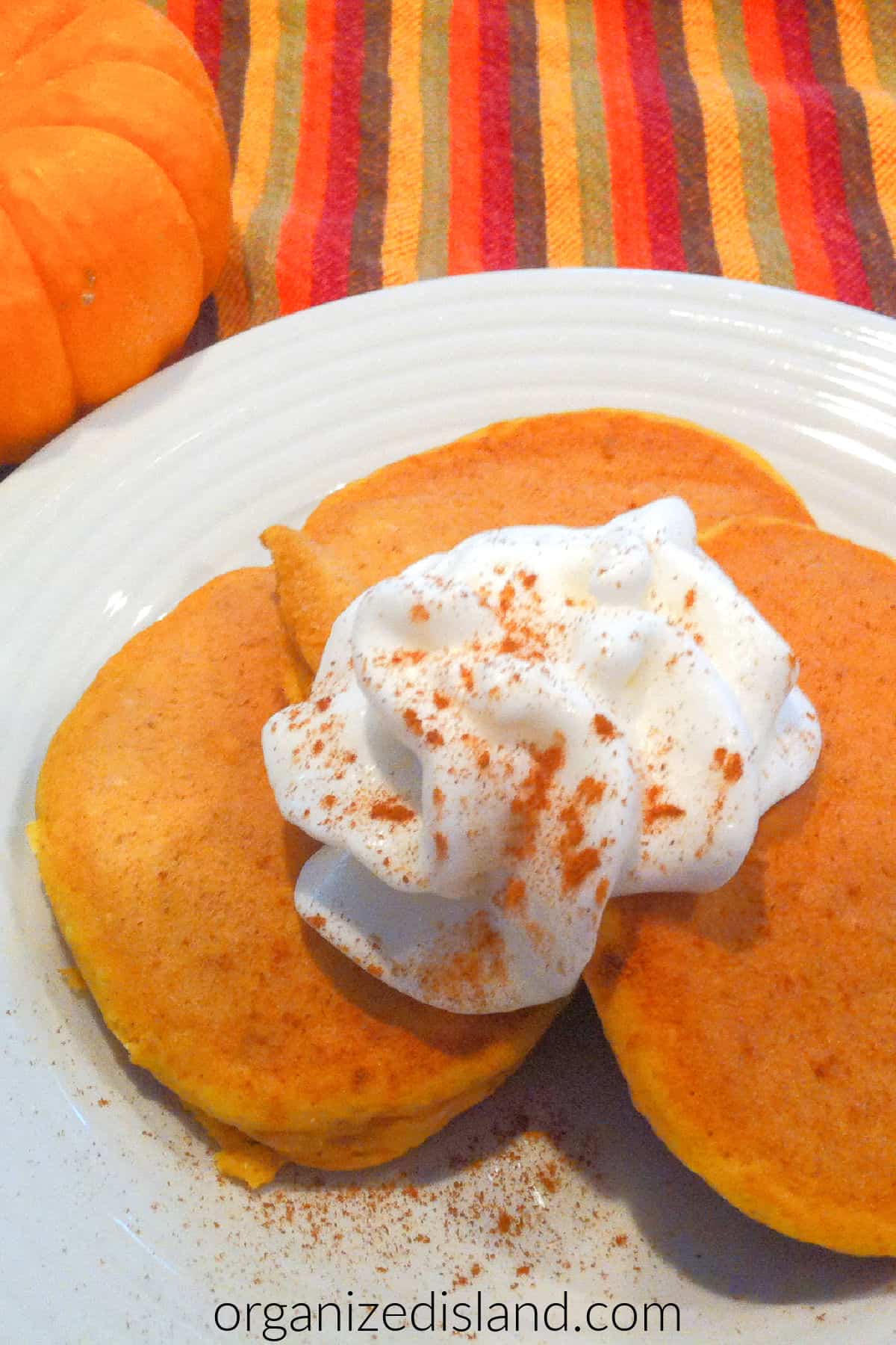 Easy Bisquick Pumpkin Pancakes on plate