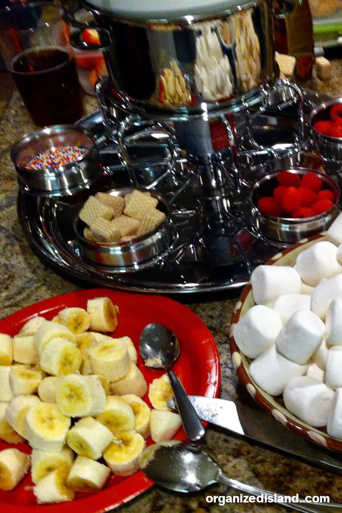 Fondue party with fresh fruit.