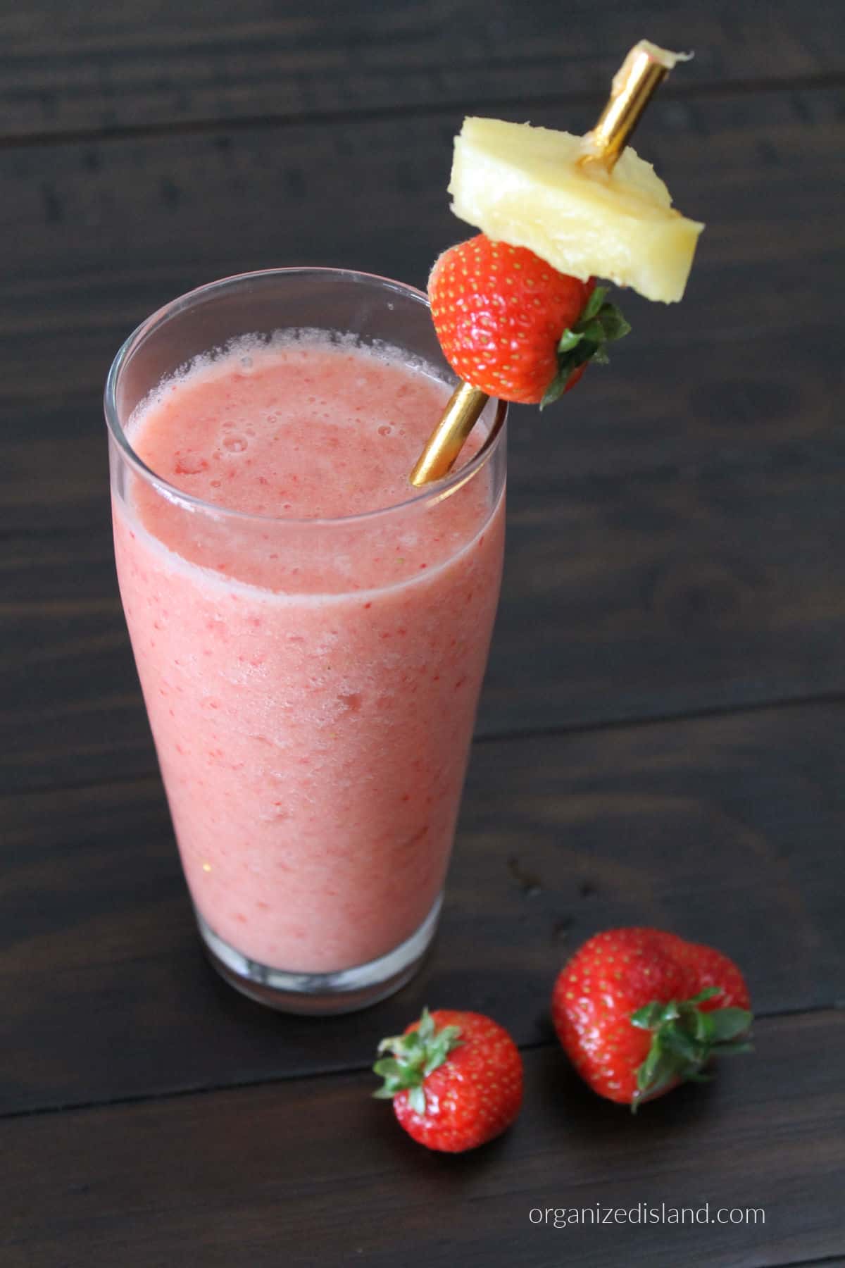 Easy Pineapple Strawberry Smoothie in glass.