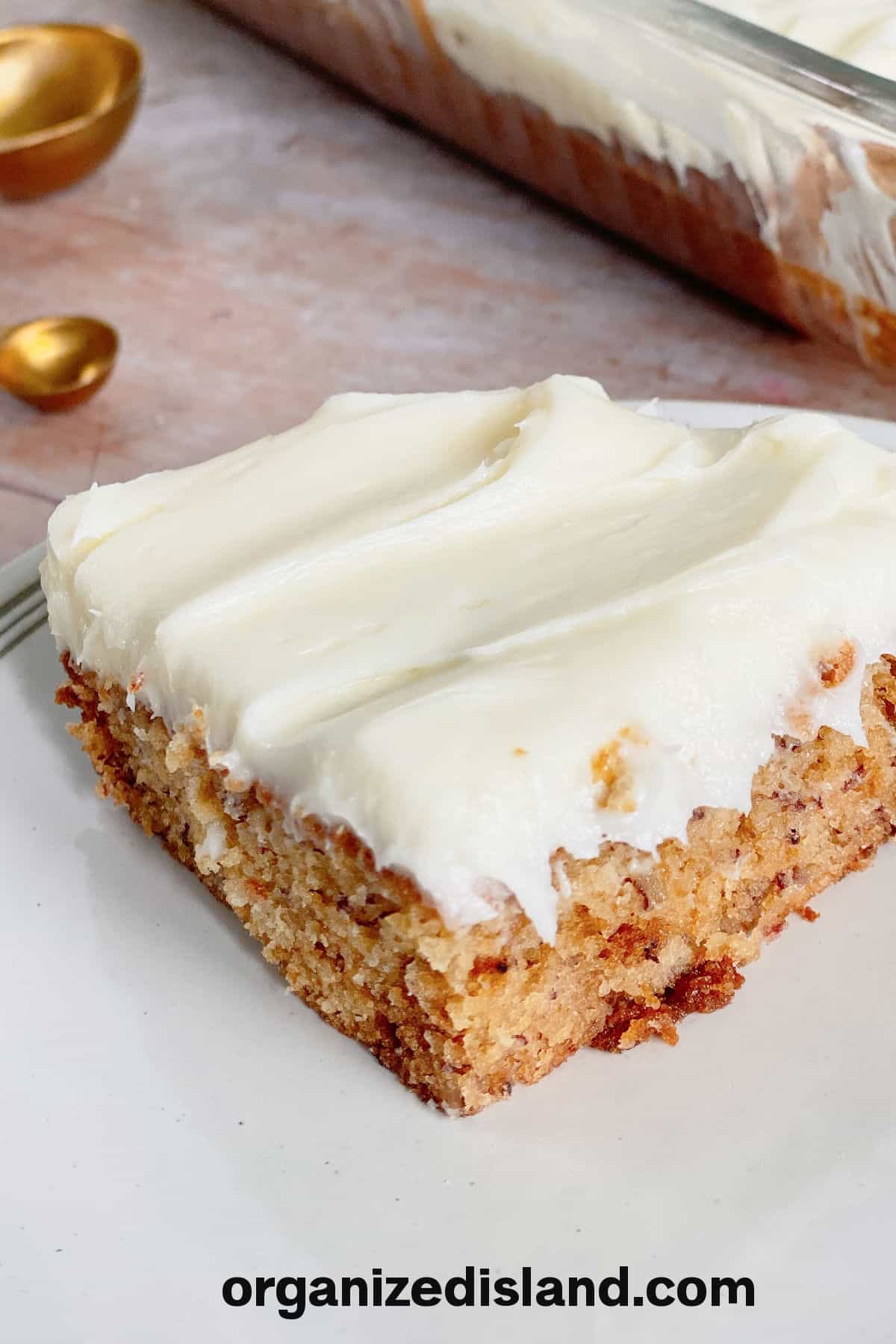 Easy Cream Cheese Frosting on piece of carrot cake.