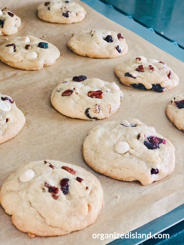 Cranberry White chocolate chip cookies  on parchment paper.