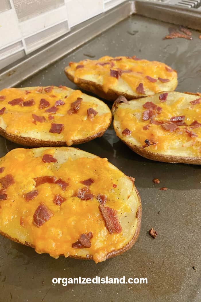 Potato skins with cheese and baocn.