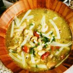 Slow Cooker White Chicken Chili in bowl with spoon