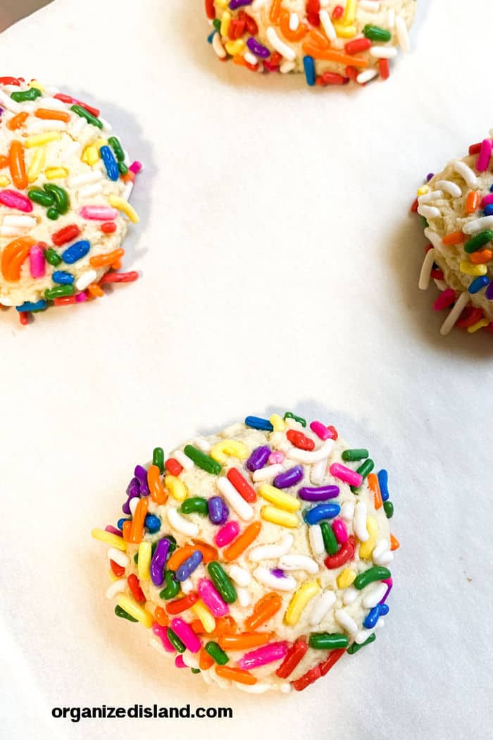 Confetti ball cookies covered with sprinkles.