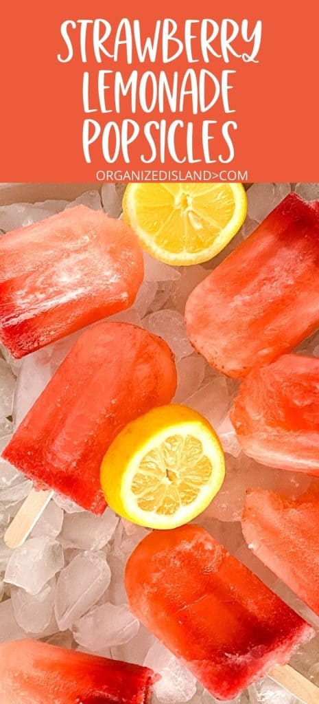 Strawberry Lemonade Popsicles on ice.