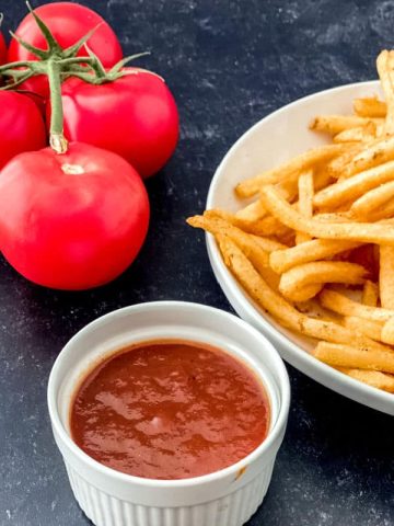 Homemade Ketchup with tomatoes and french fries