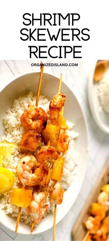 Shrimp Skewers on plate with rice.