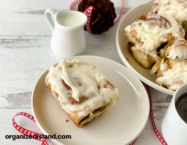 frosted cinnamon roll on plate