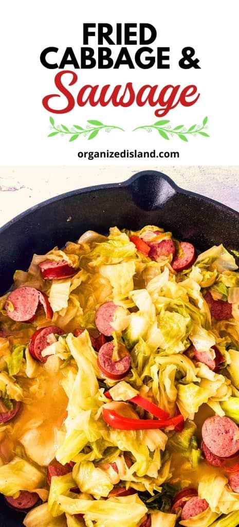 Fried Cabbage and Sausage in cast iron skillet.