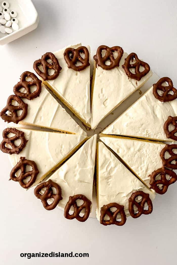 cheesecake cut with pretzels
