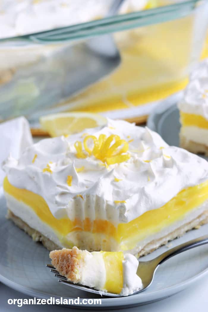 Lemon Lush slice with fork.