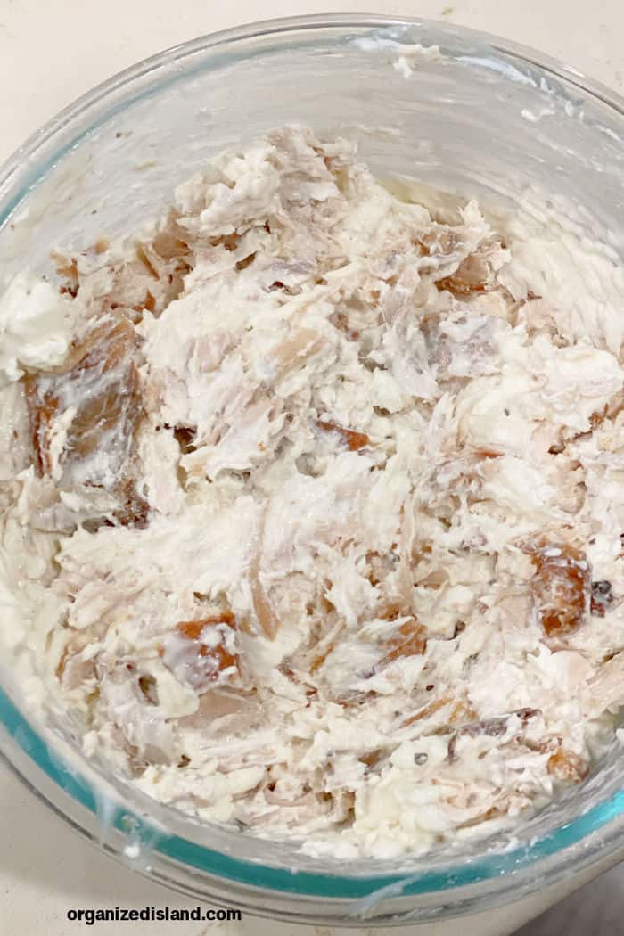 Buffalo Dip Step 1 chicken and cream cheese in bowl