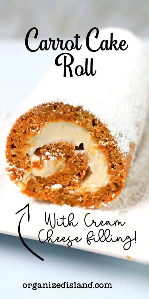 Carrot Cake Roll with powdered sugar on plate.