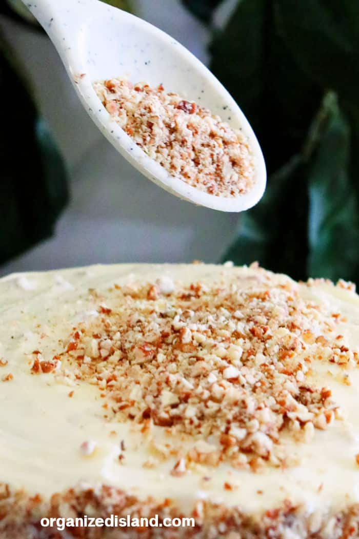 Hummingbird cake covering with pecans