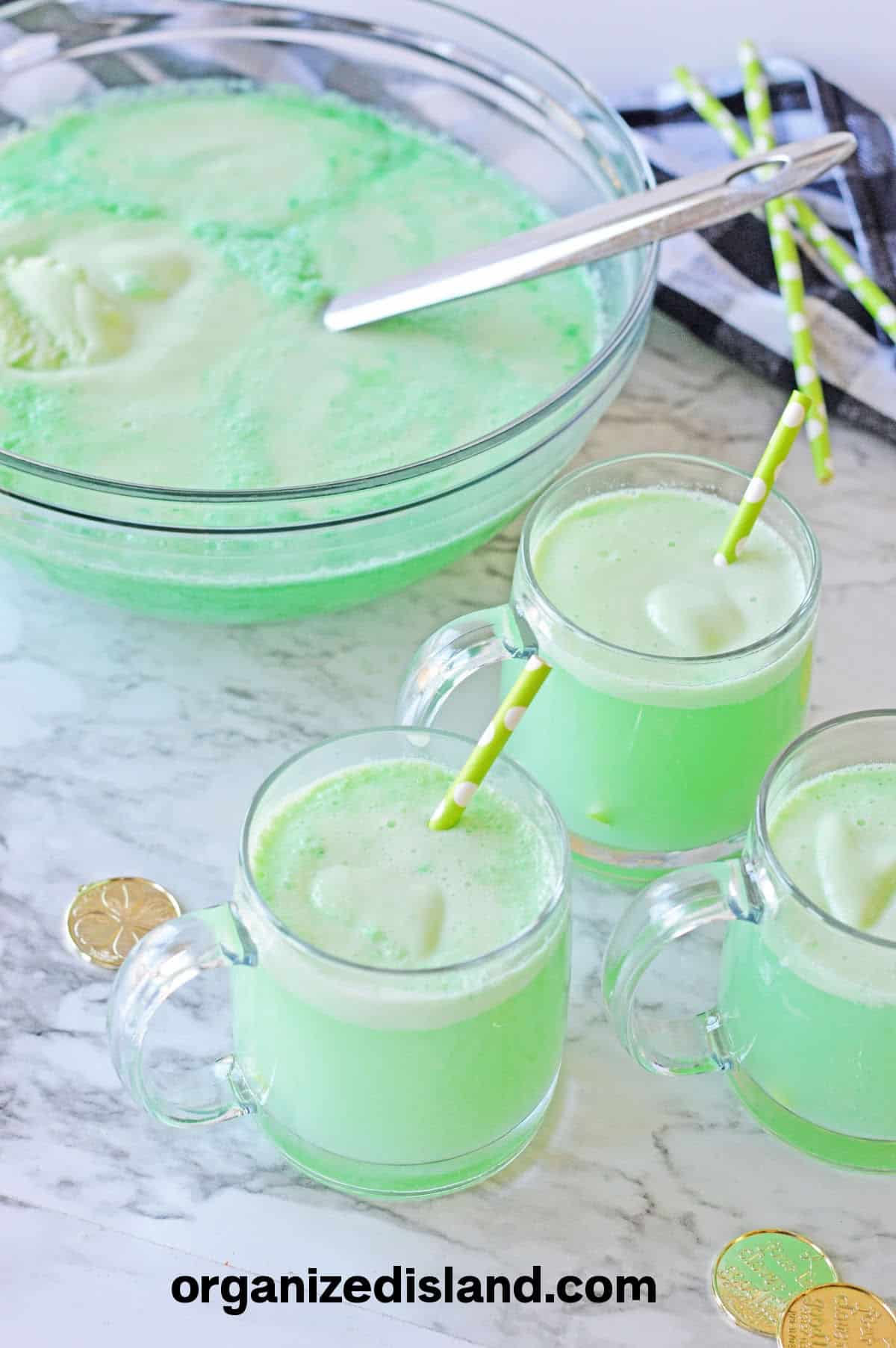 Lime Sherbet Punch Green Punch in cups.