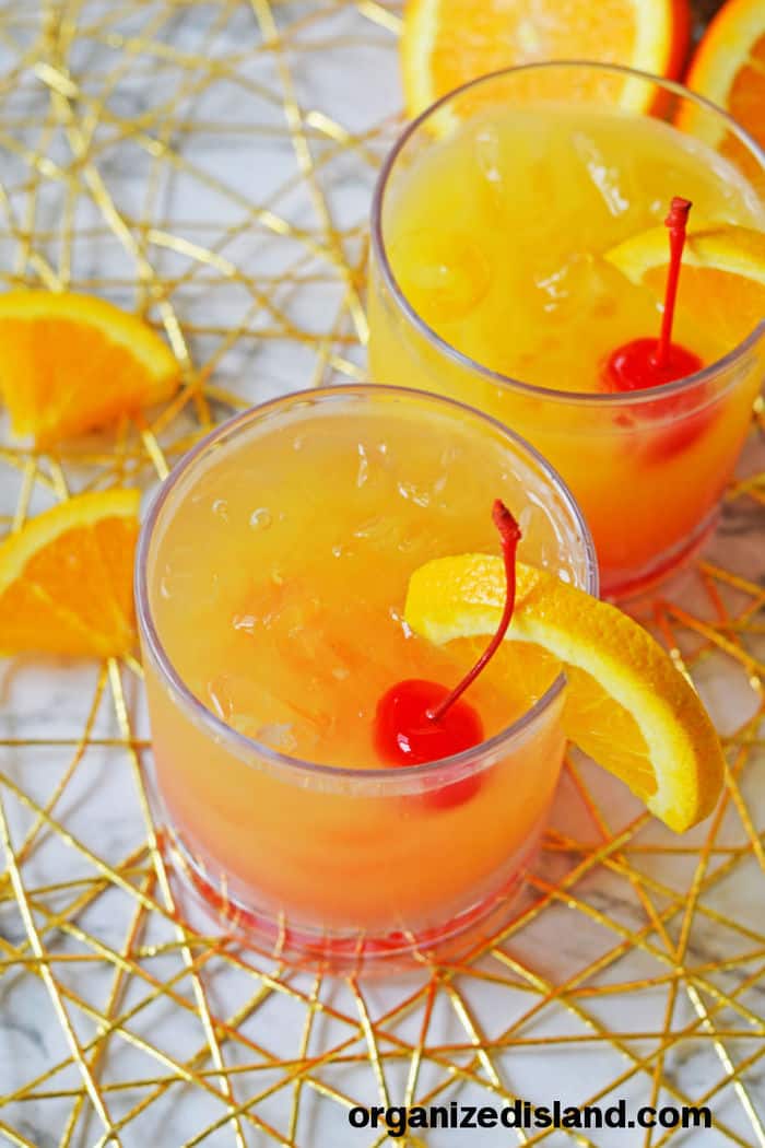 Pineapple Rum Punch cocktail Recipe in glasses.
