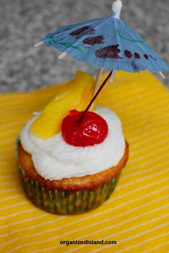 Pina colada Cupcakes with paper umbrella.