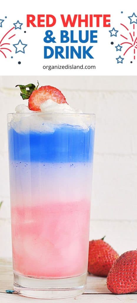 Red White and Blue Drink in class topped with whipped cream and strawberry.