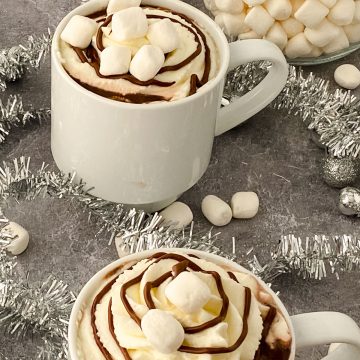 Nutella Cocoa in mugs with marshmalloes.