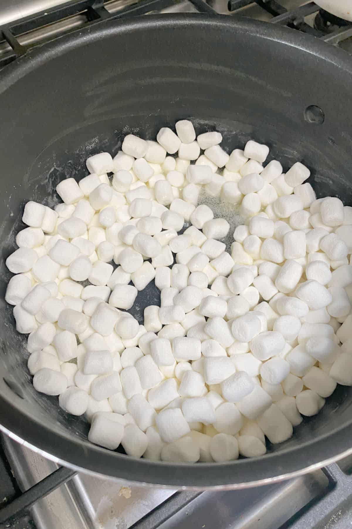 How to Make Strawberry Rice Krispie Treats - step one melting marshmallows.