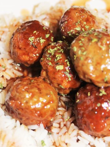 BBQ Sauce and Grape Jelly Meatballs over rRice.