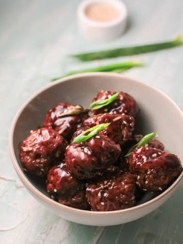Sticky Meatballs with sauce in bowl.