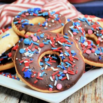 4th of July Cookies with red white and blue sprinkles on plate.