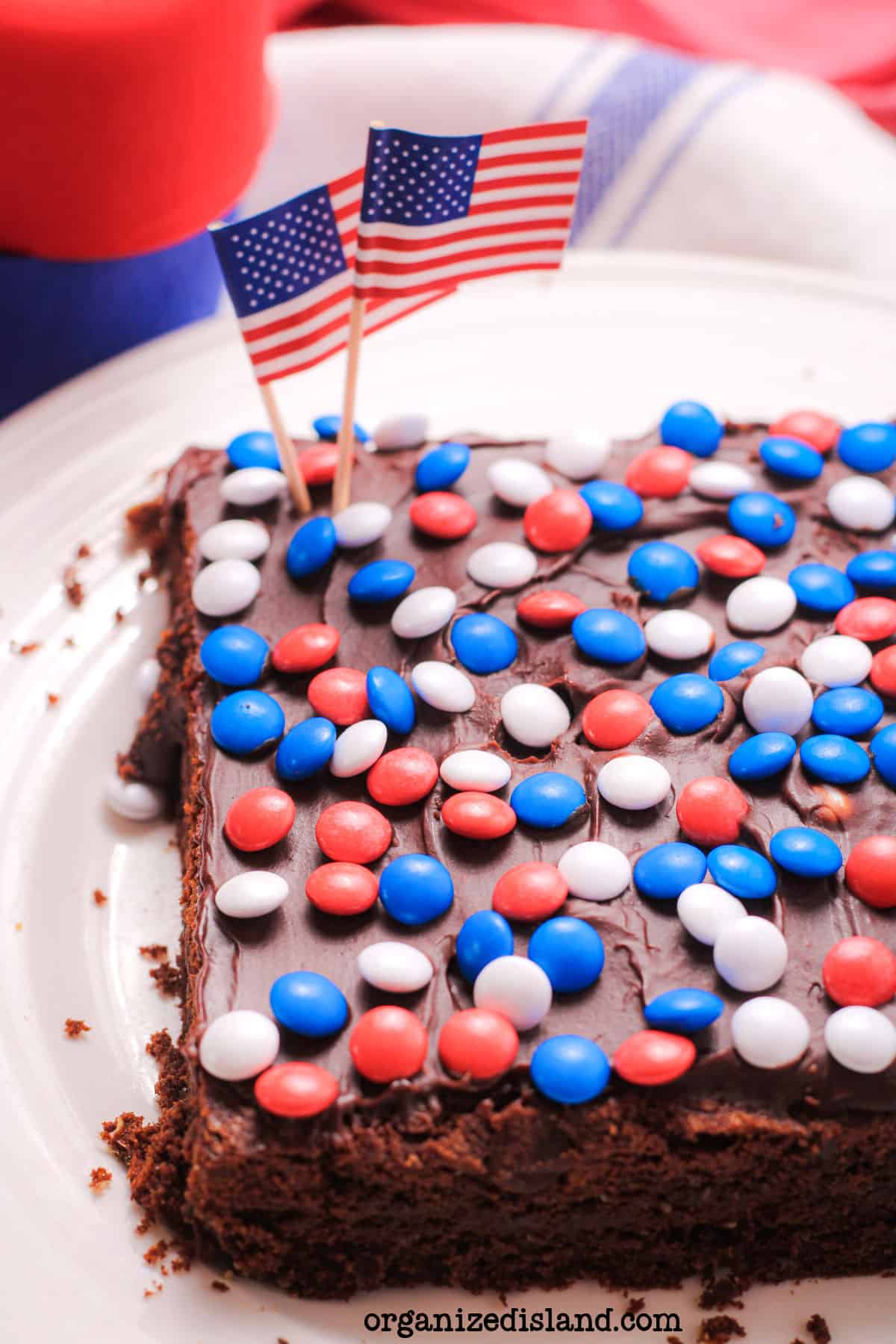 Patriotic Red White and Blue Brownies on plate.