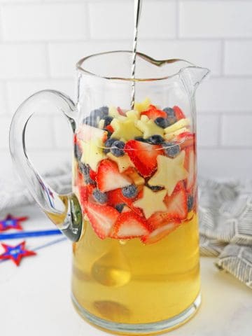 Red White and Blue Sangria in pitcher.