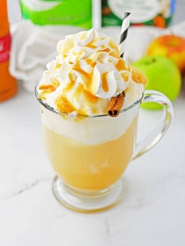 Homemade Apple Cider Floats with straw.
