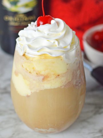 Ice Cream Coffee Floats with cherry on top.