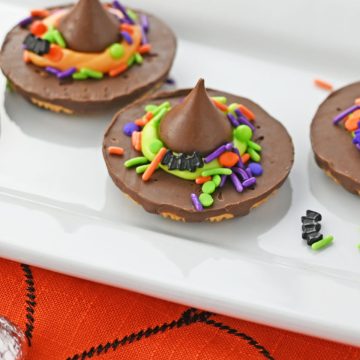 Halloween Witch Hate Cookies on plate.