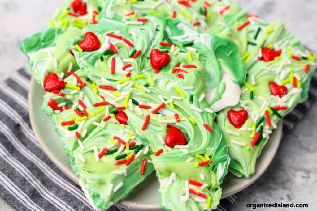 Grinch Bark pieces on plate on gray napkin