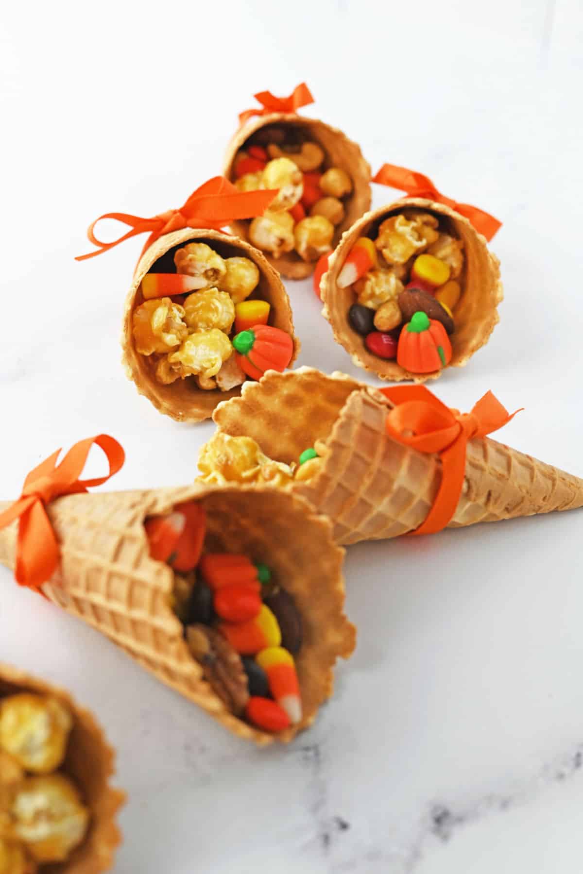 Candy Cornucopias Thanksgiving dessert yied with bows.