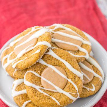 Iced Gingerbread Thumbprint Cookies on plate.