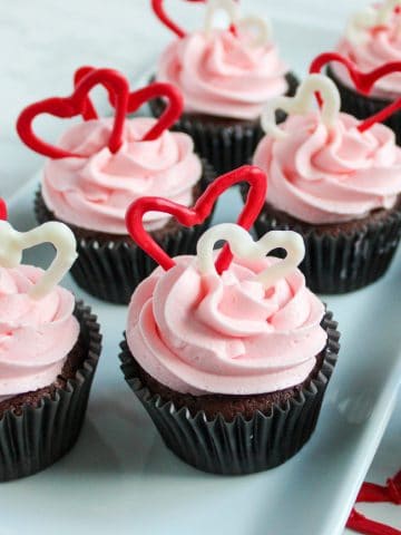 Valentines cupcakes on plate.