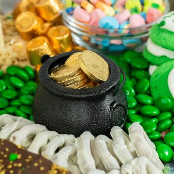 Pot of gold candies on st. Patrick's Day Dessert Charcuterie board.