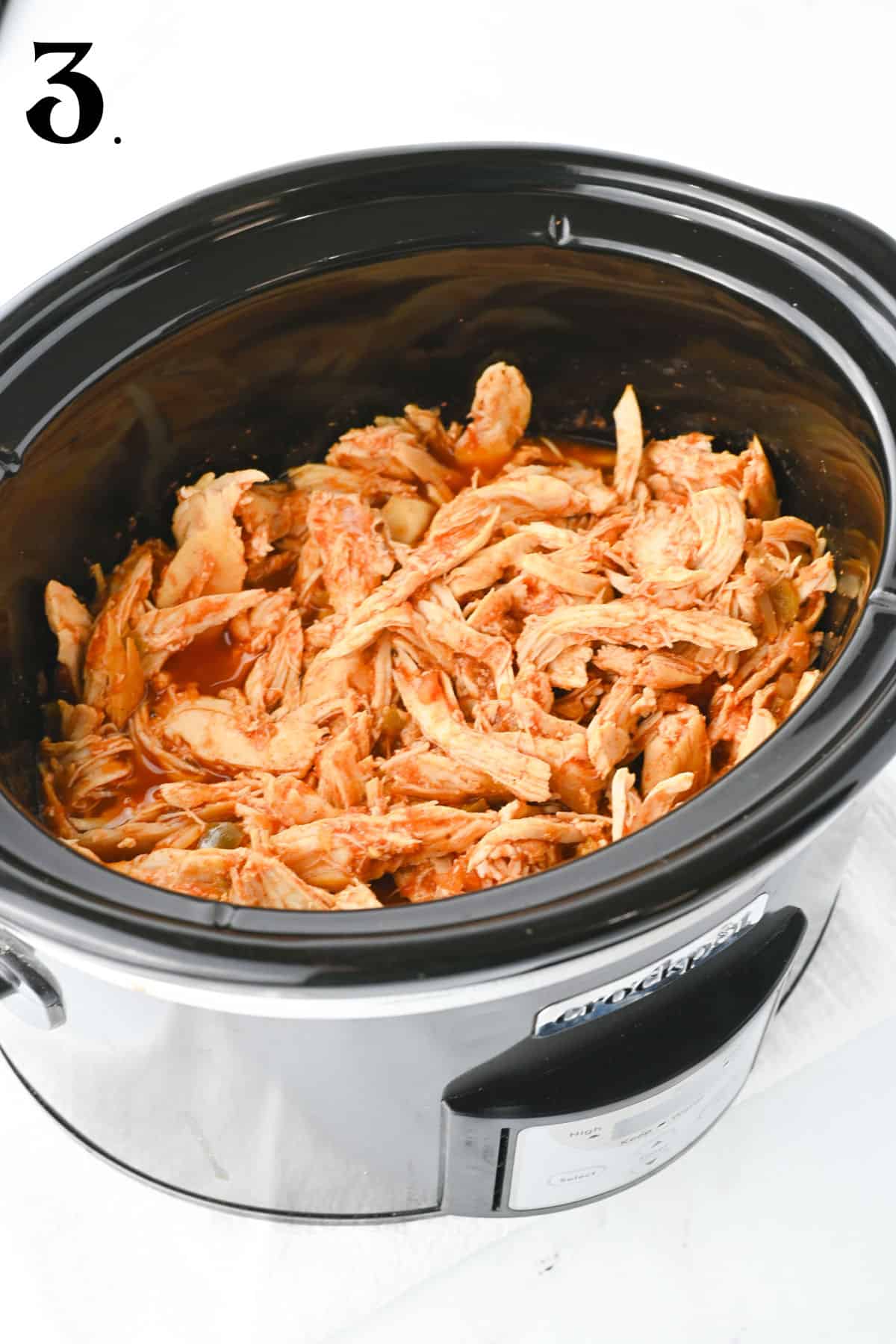 How to Make 3 Ingredient Crock Pot Chicken Tacos with sides shred chicken.