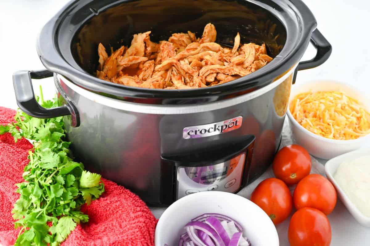 How to Make 3 Ingredient Crock Pot Chicken Tacos with sides.