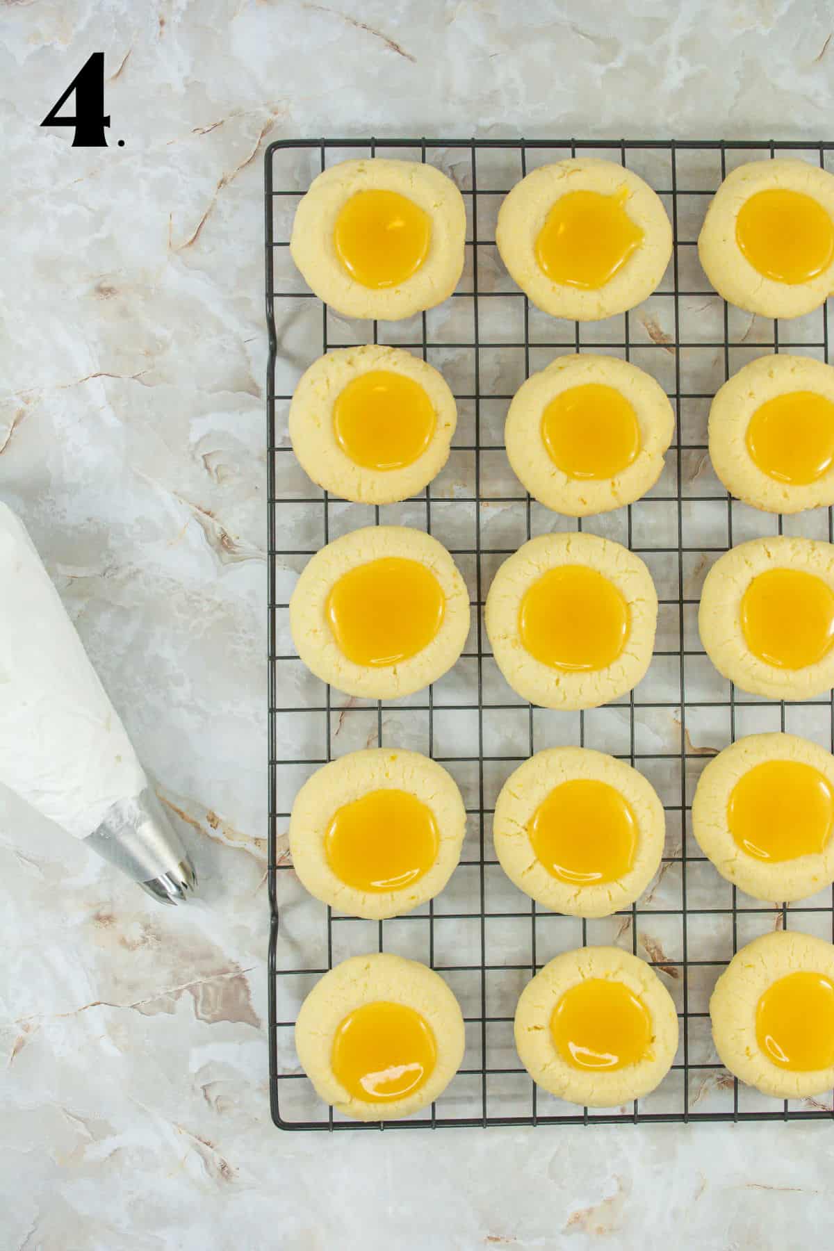 How to Make Lemon Meringue Cookies Step 4 - Baked cookies with lemon curd.