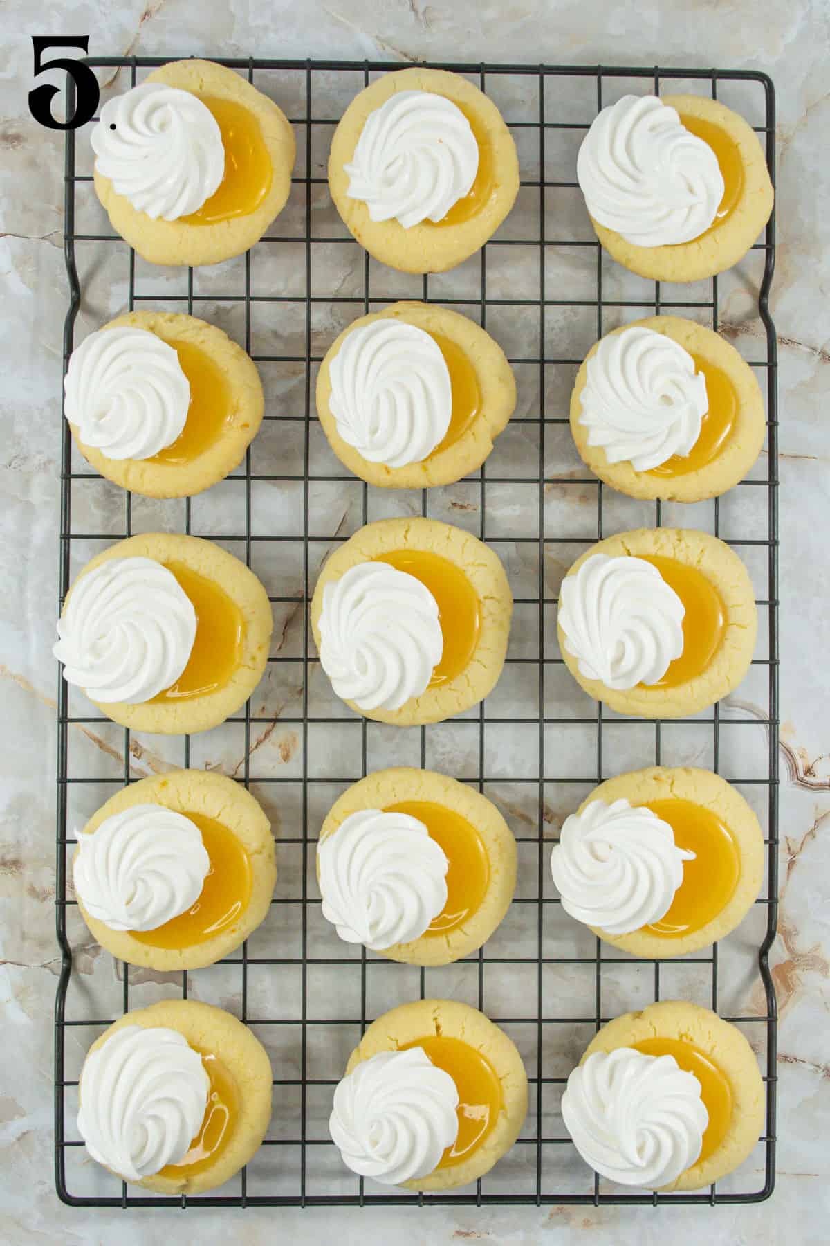 How to Make Lemon Meringue Cookies Step 5 - Baked cookies with lemon curd and merinuge.