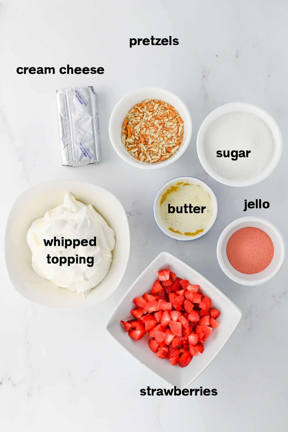 Strawberry Pretzel Dip Ingredients on counter.