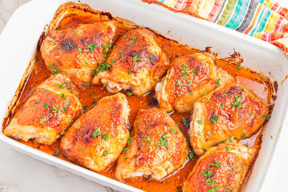 Best Honey Mustard Chicken Thighs with glaze sauce in pan