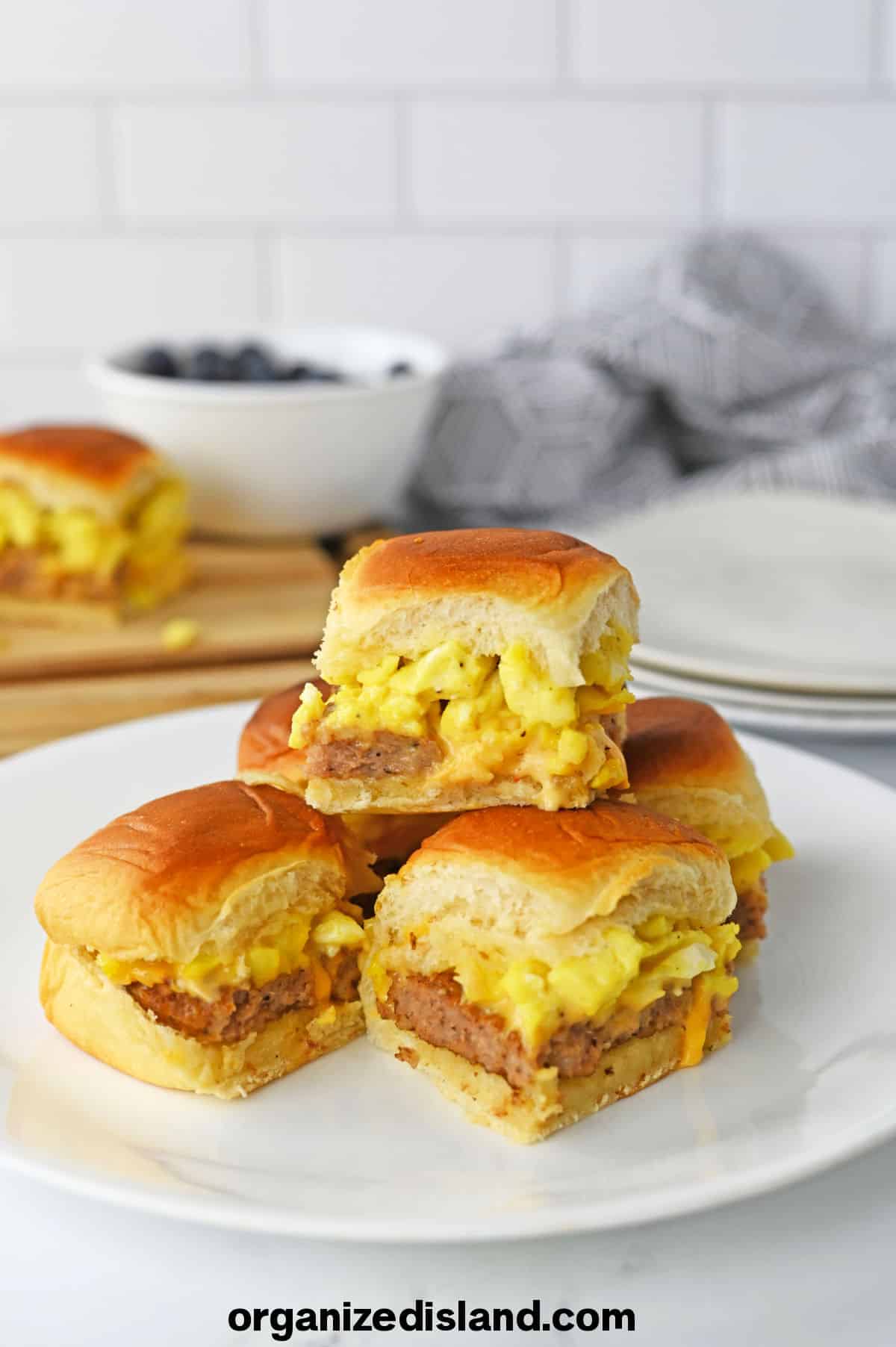 Easy Hawaiian Roll Breakfast Sliders stacked on plate