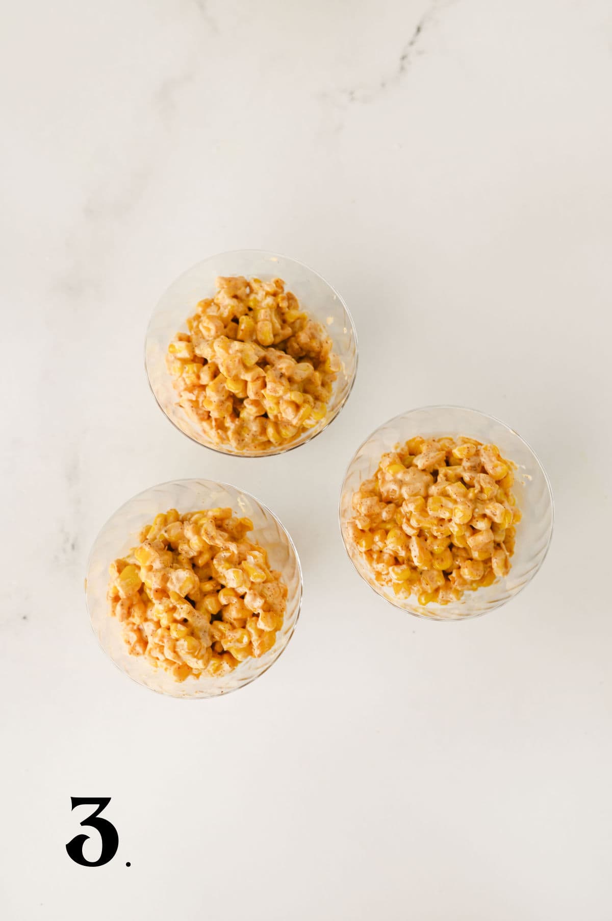_How To Make Elotes Cups Step 3 Adding corn to cups.