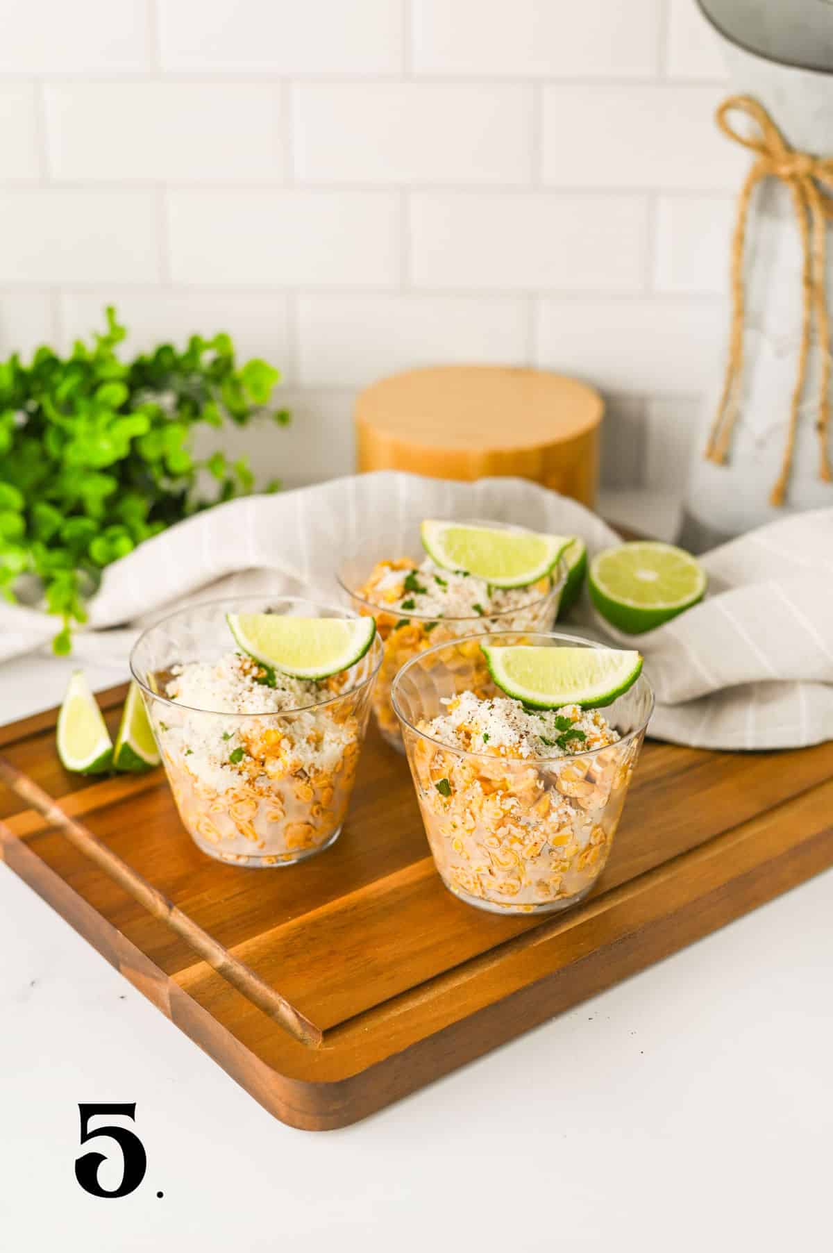 _How To Make Elotes Cups Step 5 - adding lime garnish.