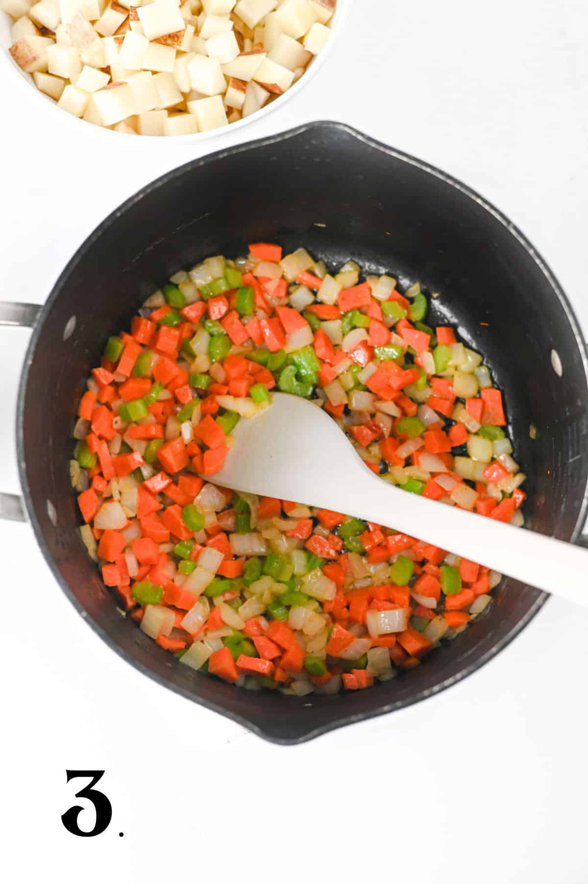 How to Make Kielbasa Potato Soup Step 3 - adding sesonings.