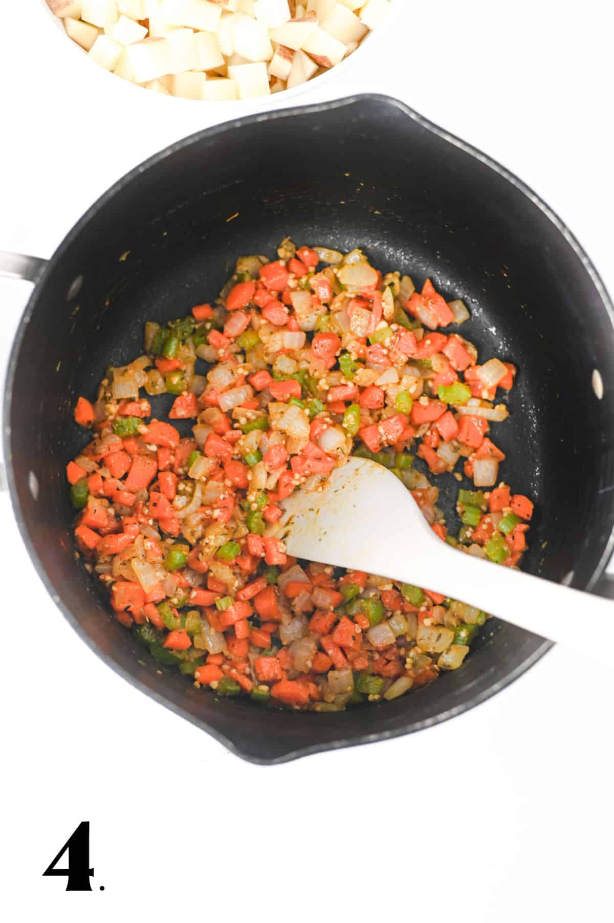How to Make Kielbasa Potato Soup Step 4 - sauteed carrots, onions and celery.