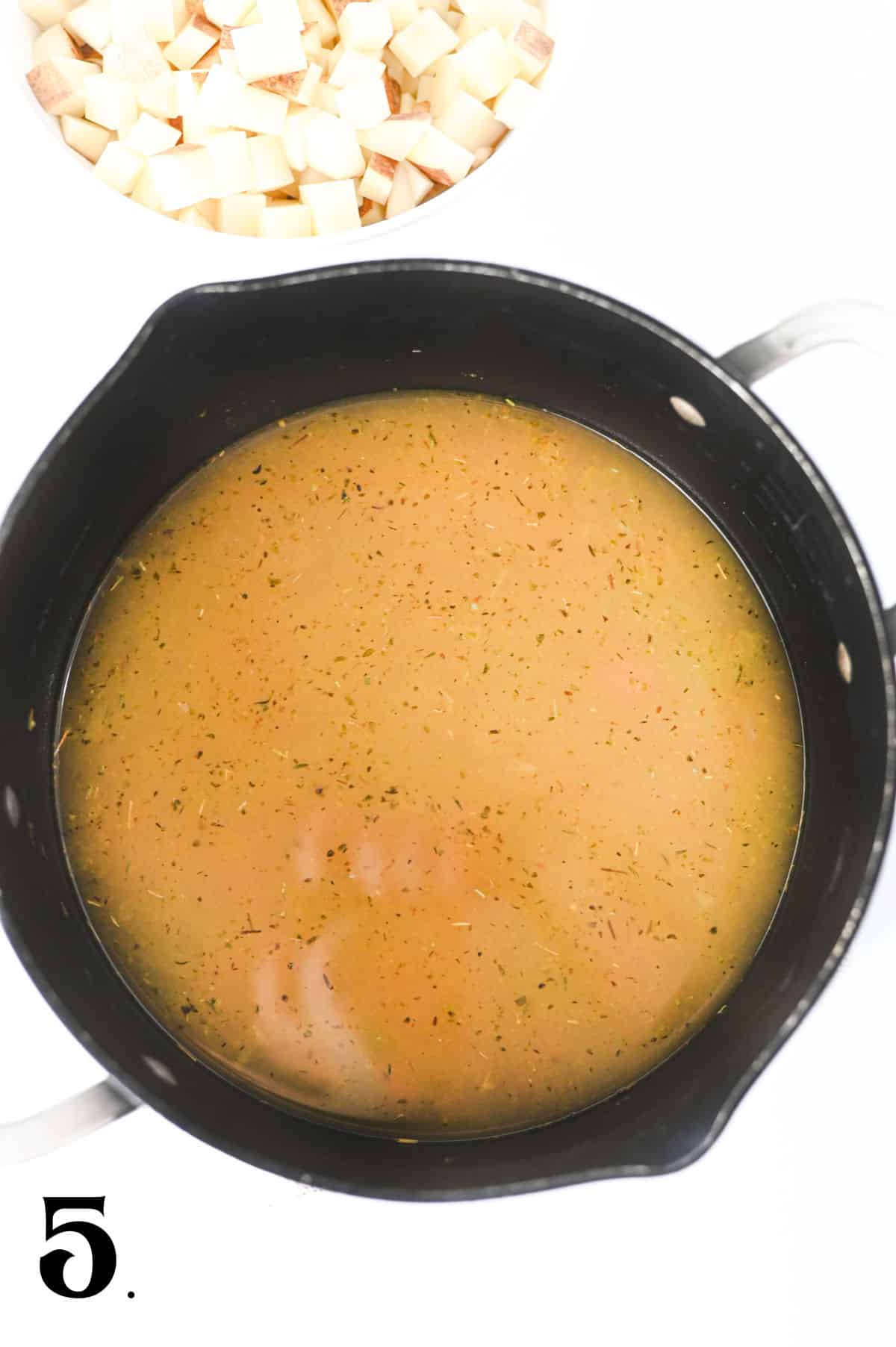 How to Make Kielbasa Potato Soup Step 5 - add broth.
